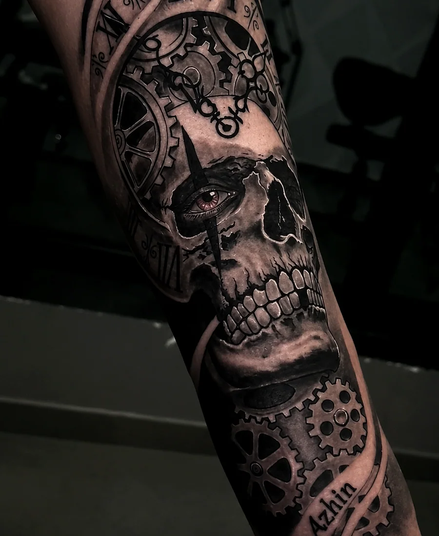 Bold black and grey cover-up tattoo after transformation.