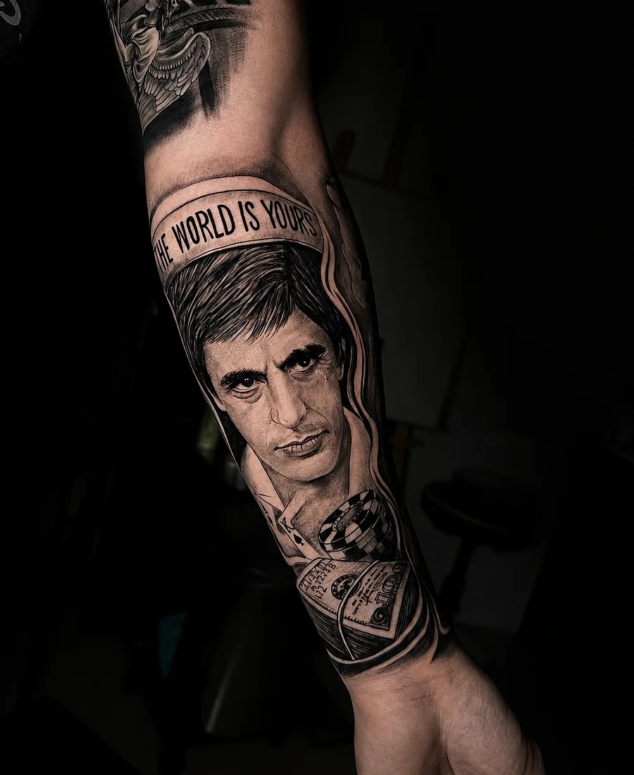 Large cinematic black and grey cover-up tattoo after transformation.